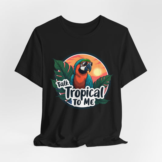 The Tropical Parrot Tee - Talk Tropical to Me Unisex Jersey Short Sleeve Shirt features a vibrant parrot in sunglasses, lush green leaves, and a sunset for playful, tropical vibes.