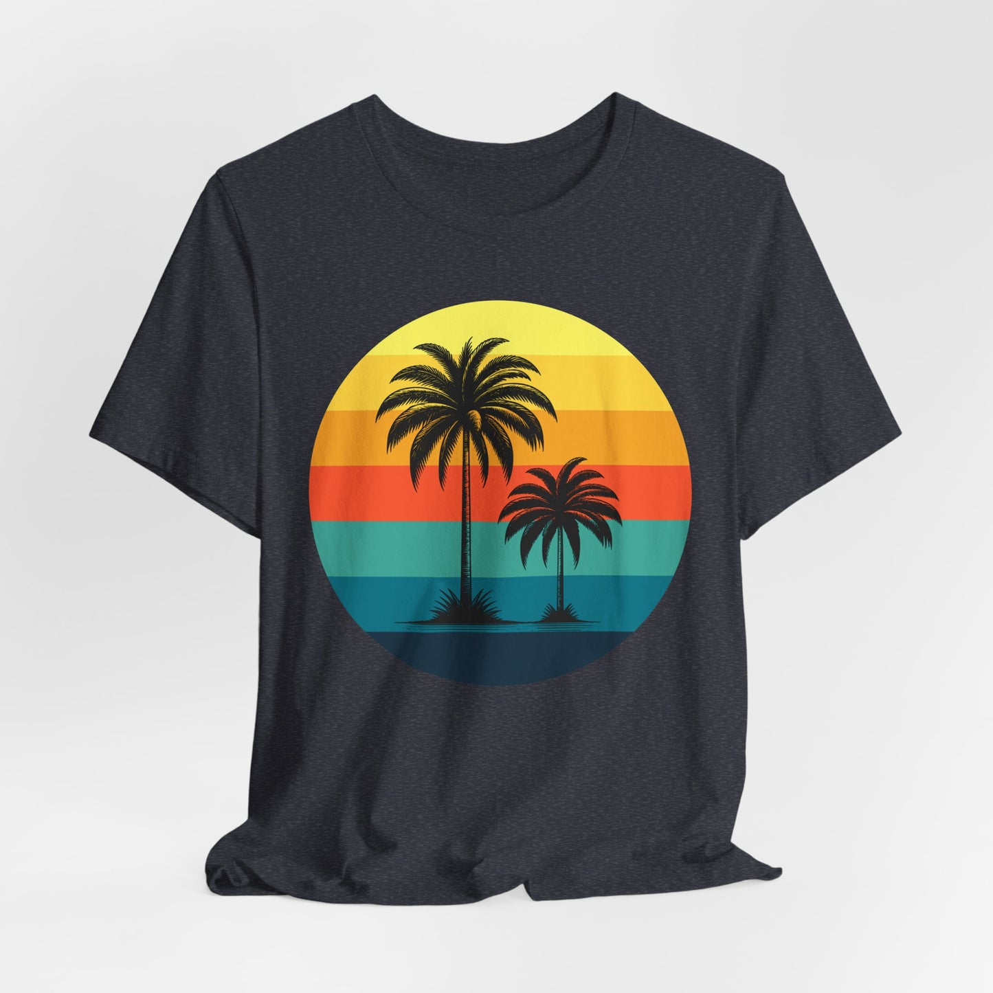 The Sunset Palm Trees Unisex Jersey T-Shirt features a black tee with a circular retro sunset design in yellow, orange, red, and teal stripes, plus palm tree silhouettes—perfect for tropical events or summer holidays.