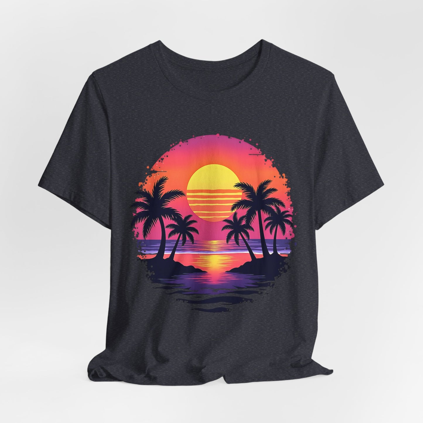 The Tropical Sunset Graphic T-Shirt is a unisex jersey short sleeve shirt crafted from soft Airlume cotton, featuring a vibrant tropical sunset with palm trees—ideal for effortless summer vibes.
