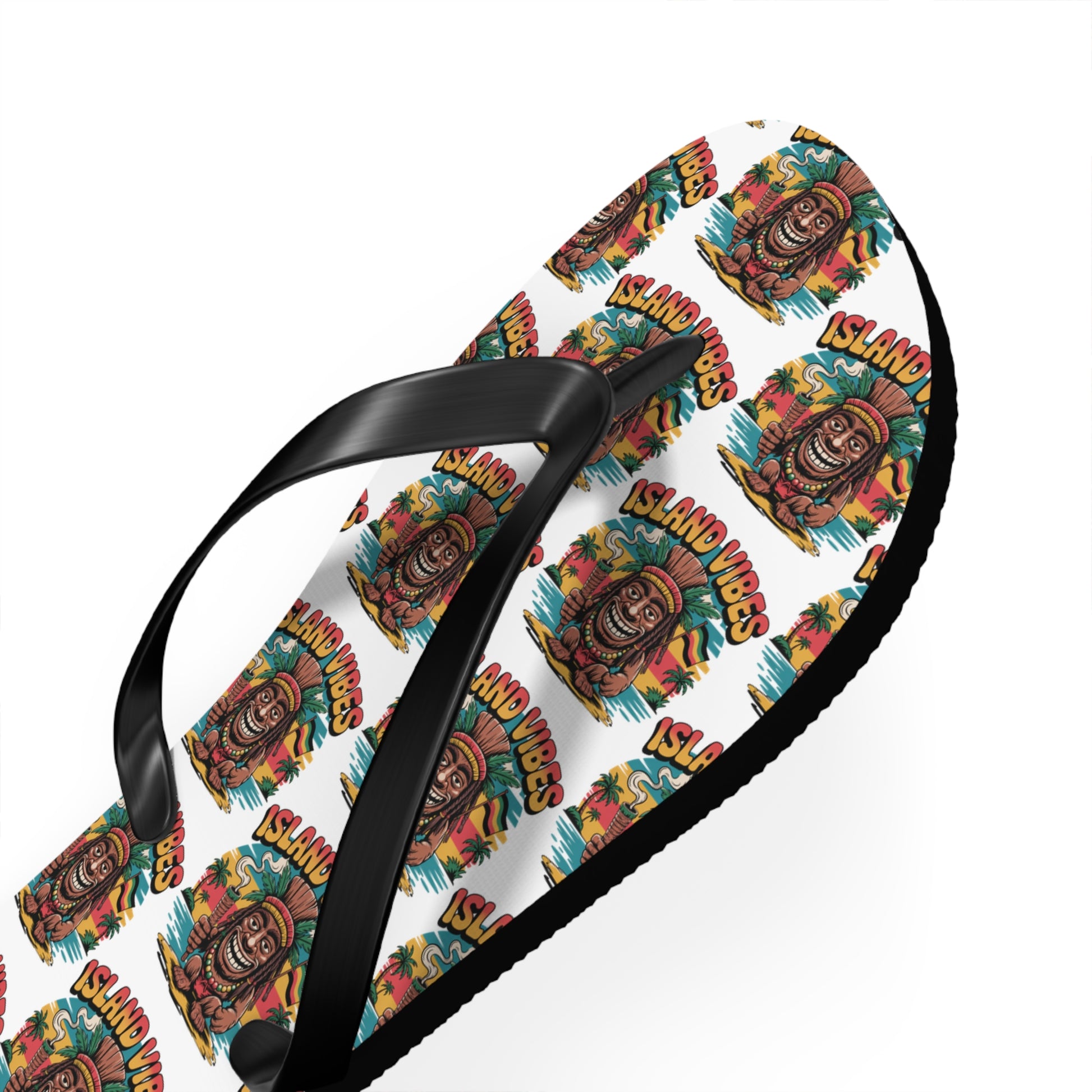 Step into summer with Island Vibes Tiki Flip Flops—colorful casual footwear featuring black straps and a tropical tiki mask and flower pattern on a white base, perfect for beach lovers and vacations.
