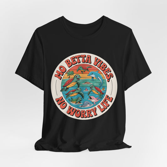 The Mo Betta Vibes Unisex Jersey T-Shirt is a black, relaxed-fit tee with a vibrant sunset graphic of sea turtles, dolphins, and palm trees. Features the cheerful slogan “NO BETTA VIBES, NO WORRY LIFE”—ideal for casual summer style.