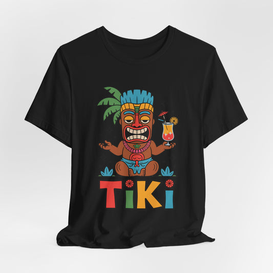The Tiki Party Unisex Jersey Tiki T-Shirt - Tropical Vibe Graphic T-Shirt features a vibrant tiki figure with a drink, bold TIKI lettering, palm backdrop, and eco-conscious production—perfect for summer parties.