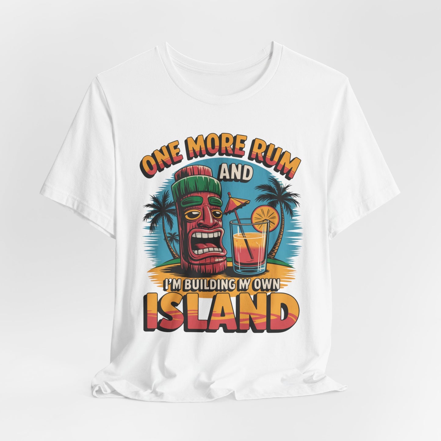 The Tropical Vacation Tiki T-Shirt – One More Rum and Im Building My Own Island showcases a vibrant tiki mask, palm trees, and cocktail on a white unisex jersey. Lightweight fabric makes it ideal for beach lovers seeking playful tropical style.