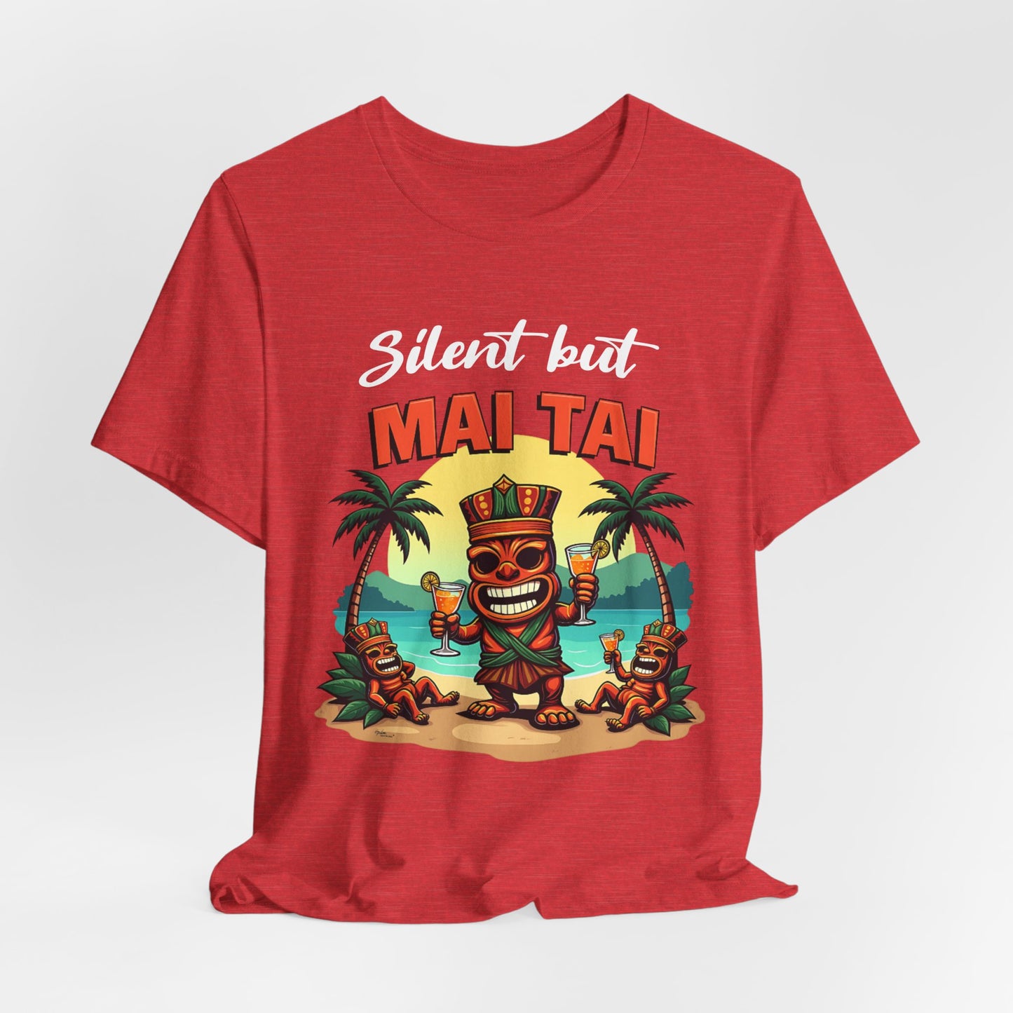The Mai Tai Graphic Unisex Jersey Tiki T-Shirt features cheerful tikis and palm trees on a beach with Silent but MAI TAI above, capturing tropical vibes—perfect for summer escapes.