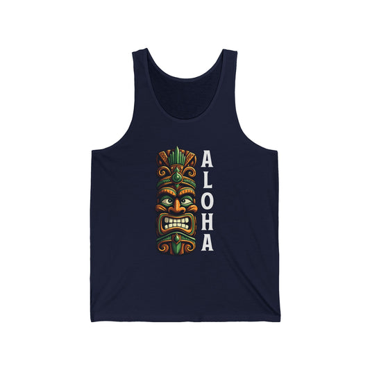 Aloha Tiki Tank Top - Unisex Jersey Tank with vibrant Hawaiian design features a navy base, colorful tiki mask graphic in green, brown, and yellow, and bold white vertical ALOHA text for ultimate tropical vibes.