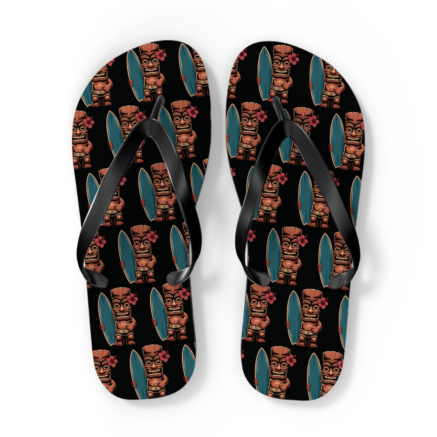 Tiki Surf Flip Flops - Fun Summer Beach Sandals feature vibrant brown tiki statues with teal surfboards and pink flowers on a solid black background, plus comfy polyester suede straps for a bold, stylish summer look.