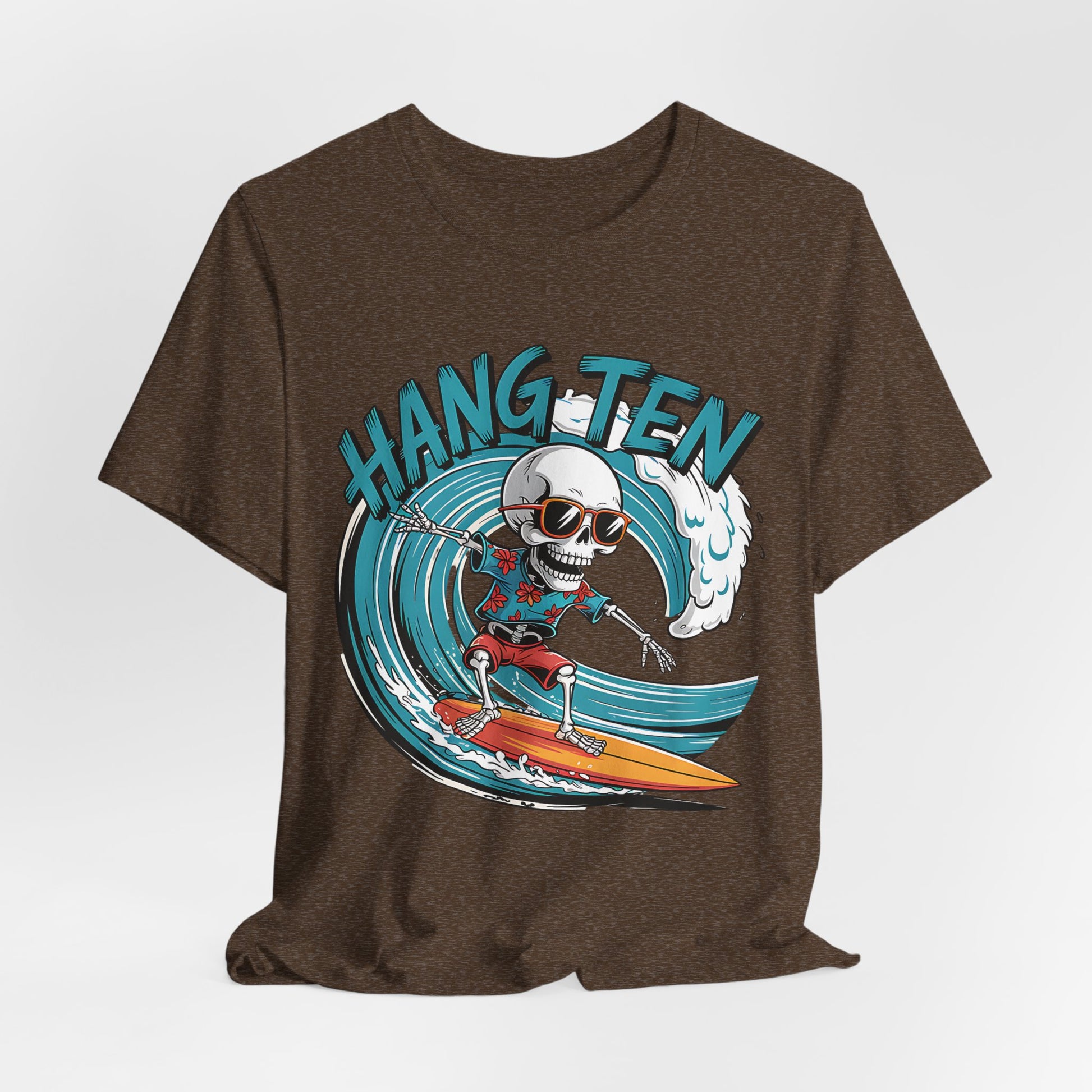 The Surfing Skeleton T-Shirt - Hang Ten Unisex Jersey Tee features a cartoon skeleton in sunglasses and red shorts surfing an orange board on blue waves, with bold blue “HANG TEN” text—perfect for beach lovers.