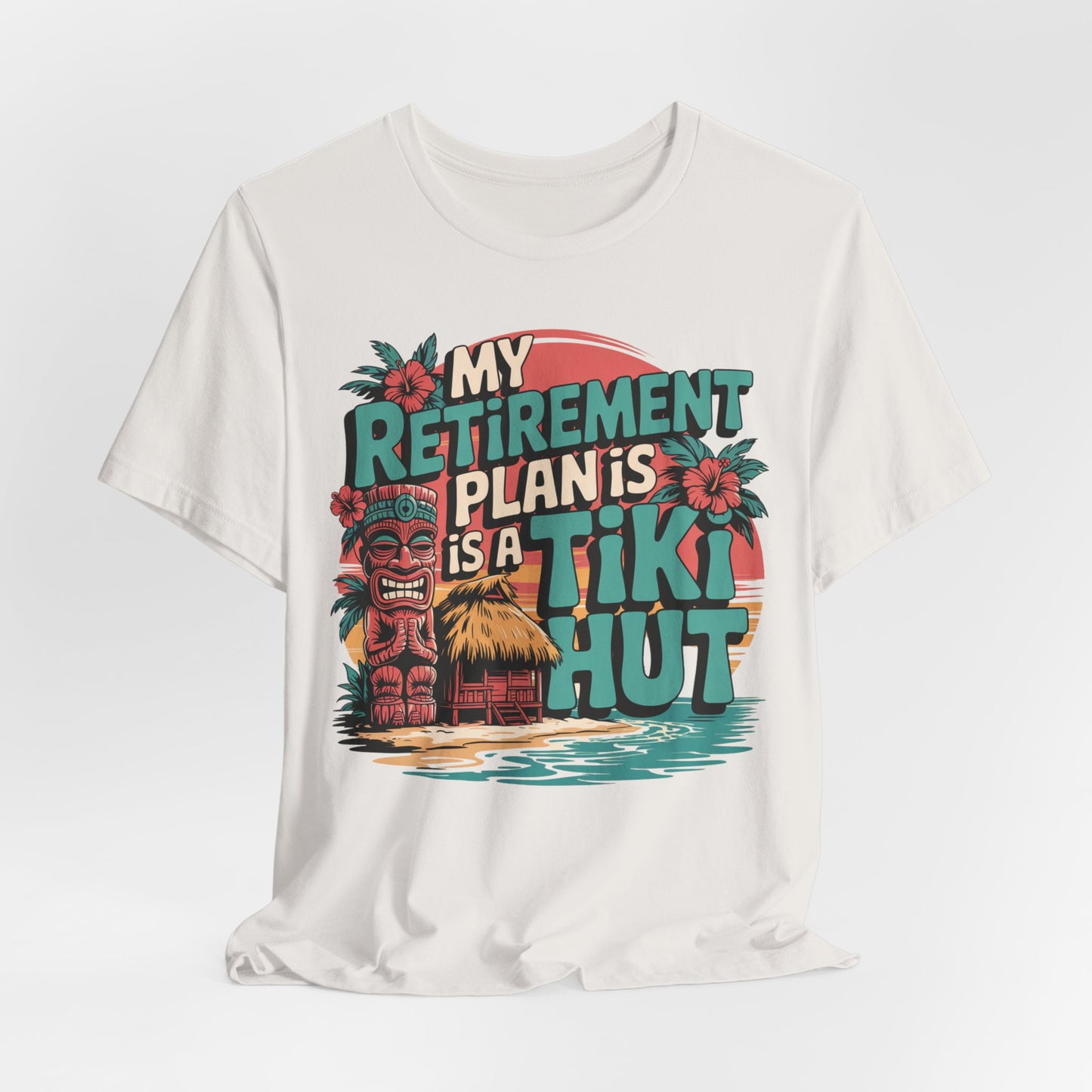 The Tiki Hut Retirement Plan Tiki T-Shirt is a fun unisex tee for beach lovers, featuring a colorful tiki statue, hut, palm trees, and sunset with the text: My retirement plan is a tiki hut. Perfect retirement gift!.