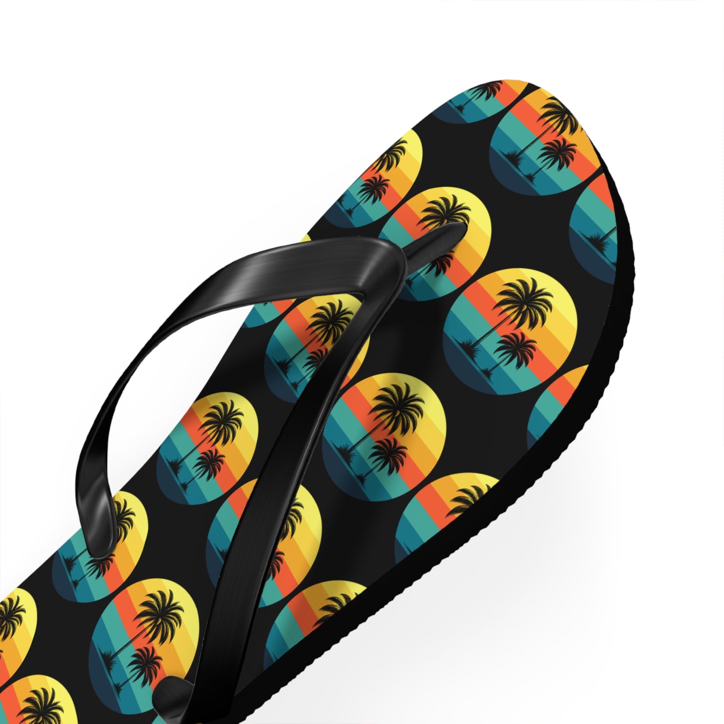 The Tropical Sunset Flip Flops - Summer Vibes with Palm Trees feature black straps and a vivid sunset design with palm trees and ocean waves—perfect for beach lovers wanting to add colorful flair to their summer look.