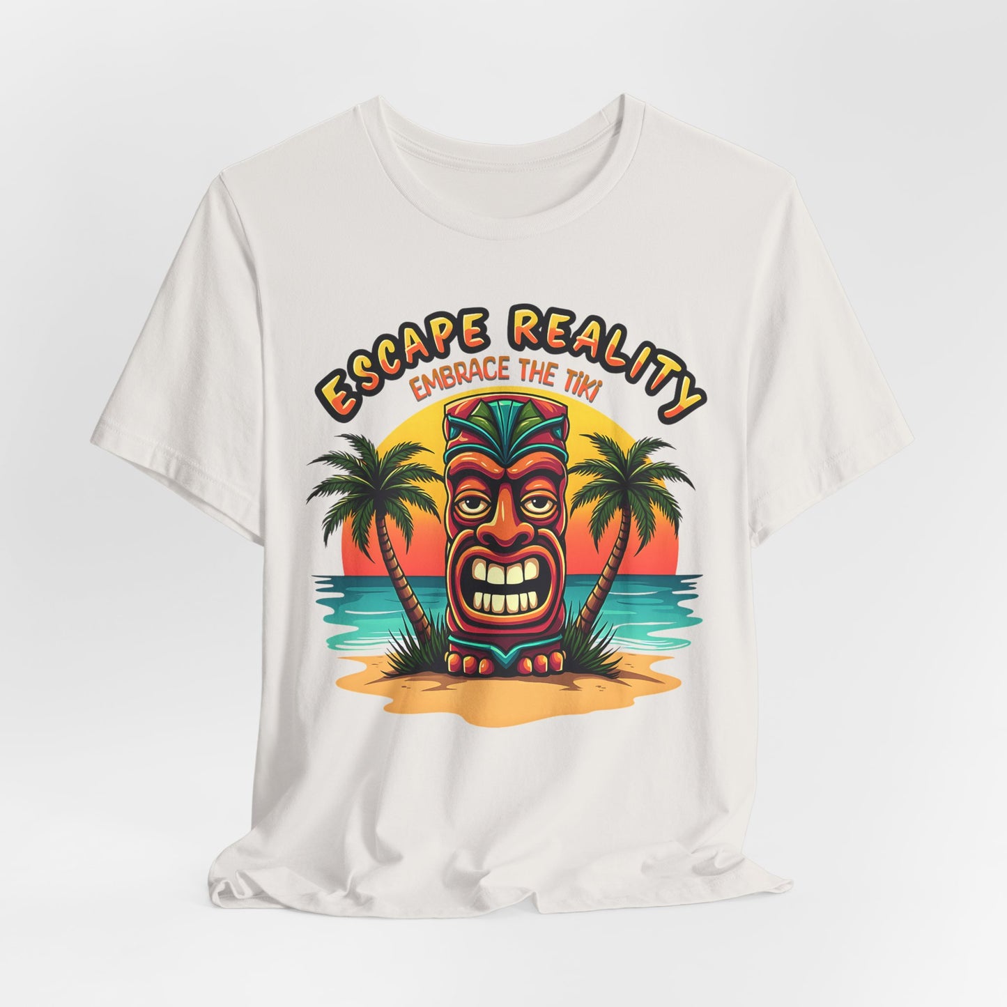 Capture the tropical vibe with the Escape Reality Unisex Tiki T-Shirt—featuring a colorful tiki mask, palm trees, and sunset, plus “Escape Reality” and “Embrace the Tiki.” Perfect for summer and beach getaways. Sustainable cotton.
