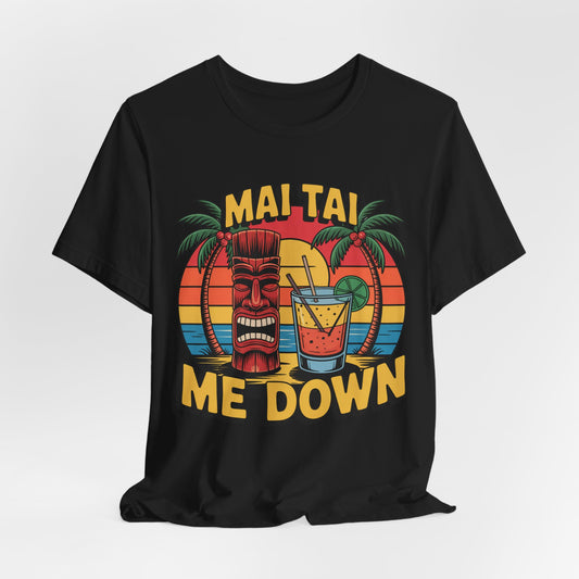 The Mai Tai Me Down Unisex Tiki T-Shirt features a colorful tiki mask, Mai Tai cocktail, palm trees, sunset, and bold “MAI TAI ME DOWN” text. Made from soft Airlume combed cotton for ultimate comfort—perfect tropical vibes summer shirt.