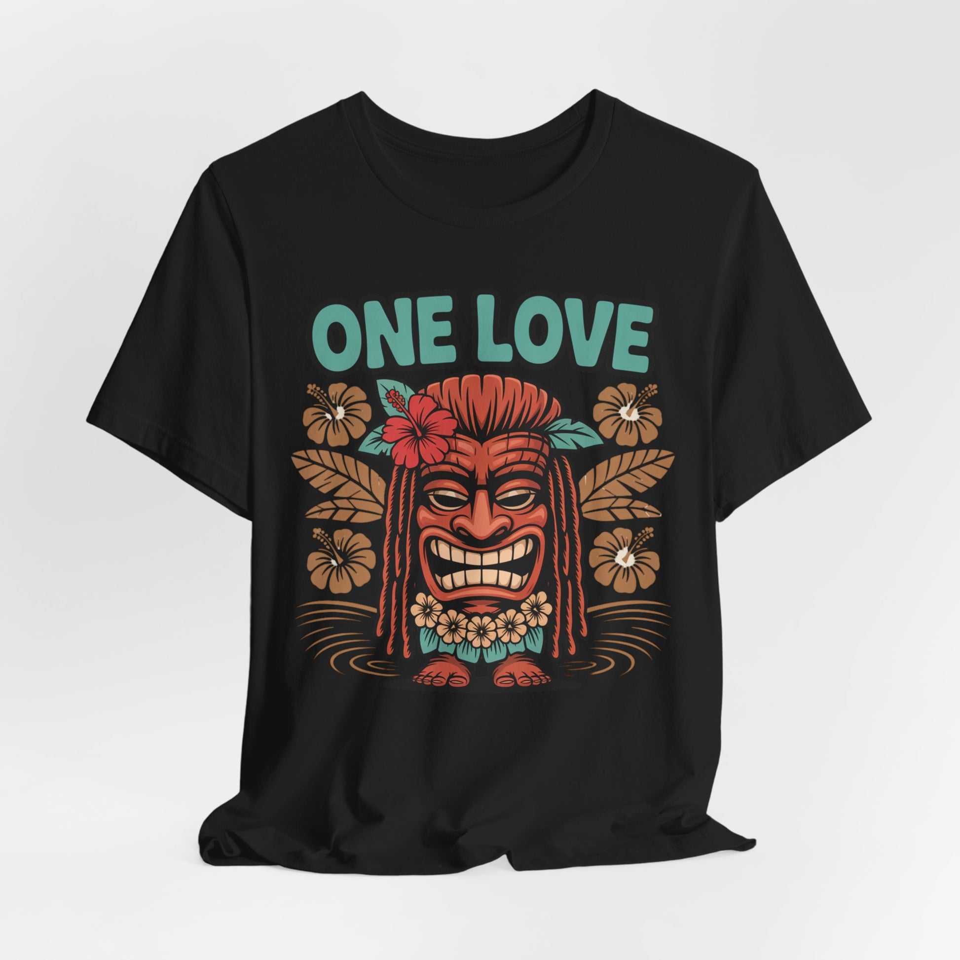 The One Love Tropical Unisex Jersey Tiki T-Shirt is a black tee with a colorful tiki mask, flowers, leaves, and bold turquoise ONE LOVE text—ideal for beach lovers and festival-goers seeking vibrant beach vibes.