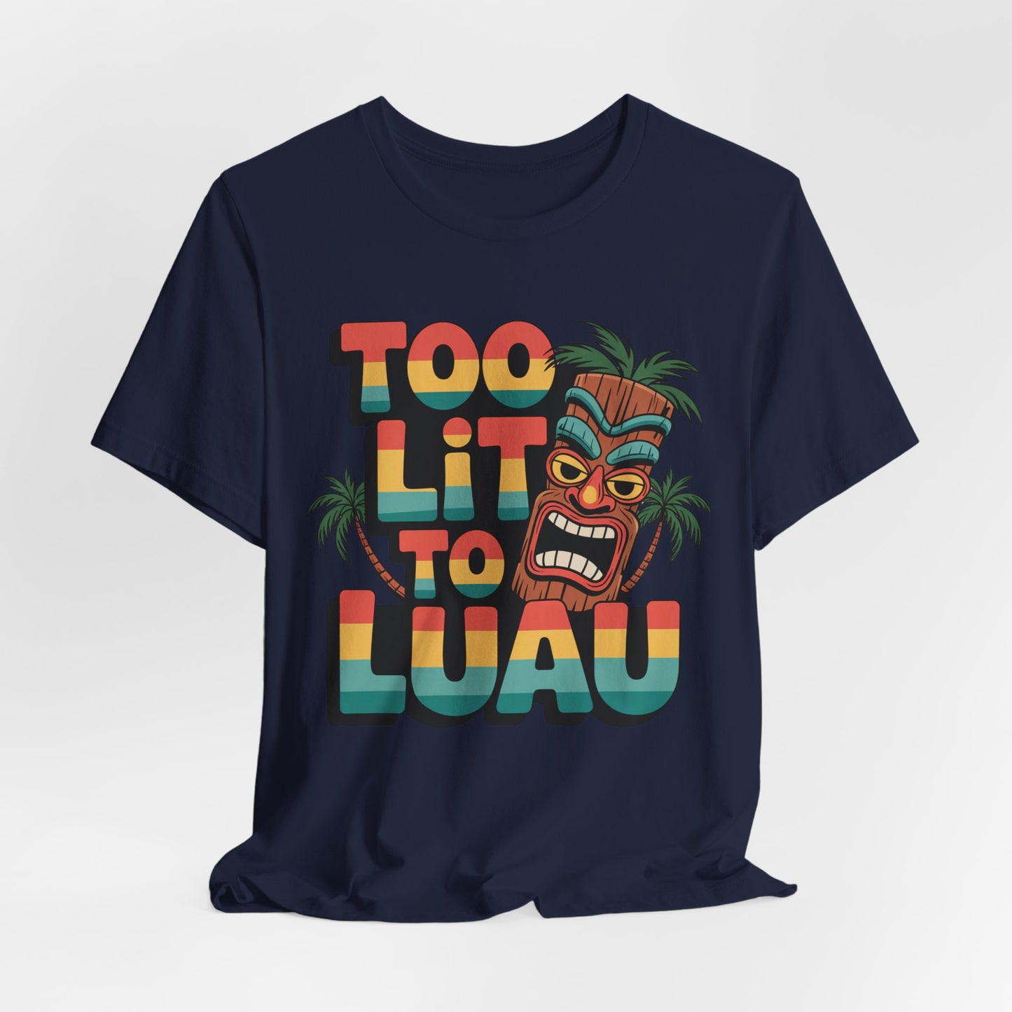 The Too Lit to Luau Unisex Jersey Short Sleeve Tiki T-Shirt features a vibrant tiki face, palm trees, and colorful lettering—perfect for summer parties and tiki gatherings.