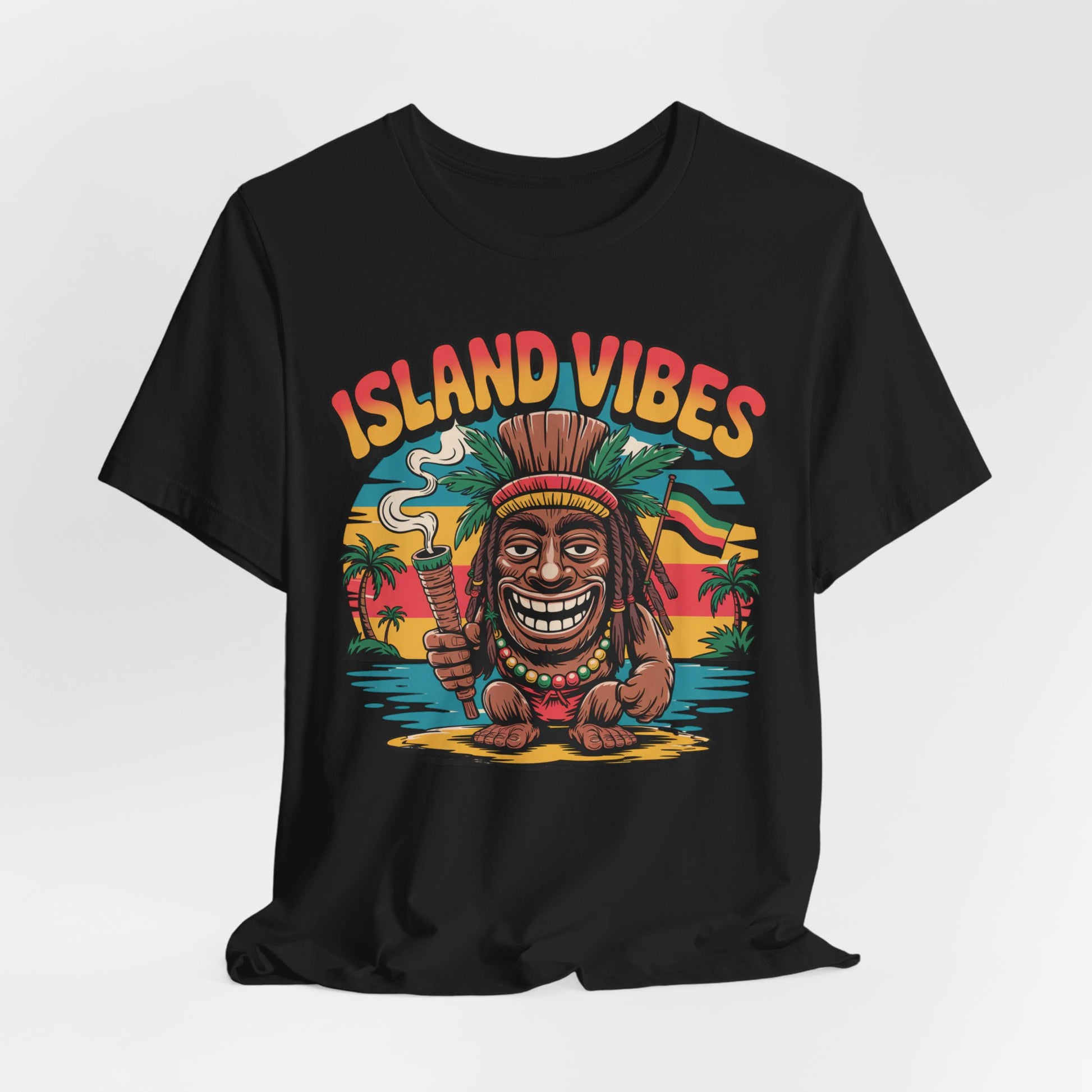 The Island Vibes Unisex Jersey Tiki T-Shirt features a colorful cartoon tiki with a joint and drink, palm trees, ocean, sunset backdrop, and bold ISLAND VIBES lettering—ideal for vacation or casual summer fun.