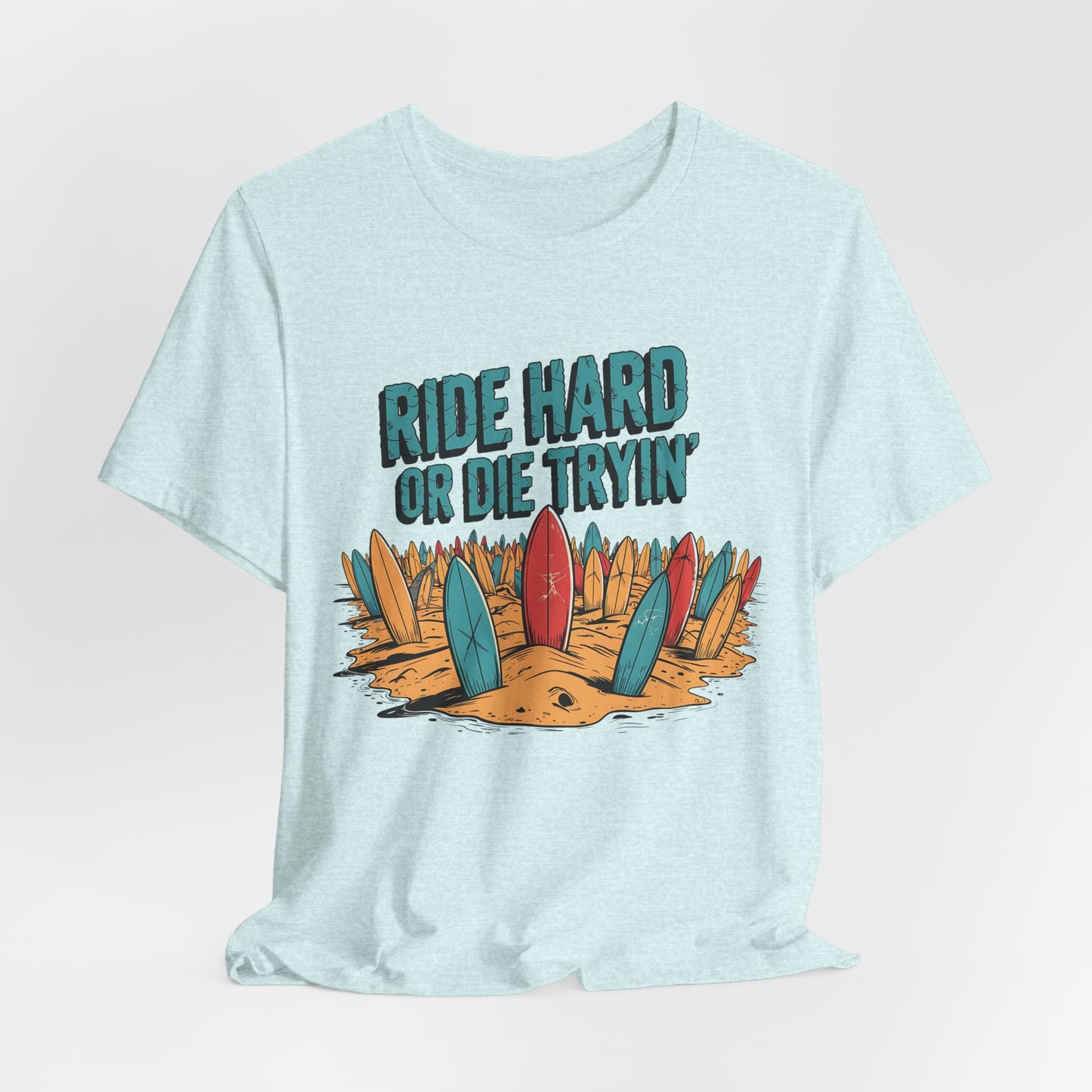 The Surfing T-Shirt - Ride Hard or Die Tryin Unisex Jersey T-Shirt features a light blue design with colorful surfboards and bold text, ideal for beach lovers and anyone living the surf adventure lifestyle.