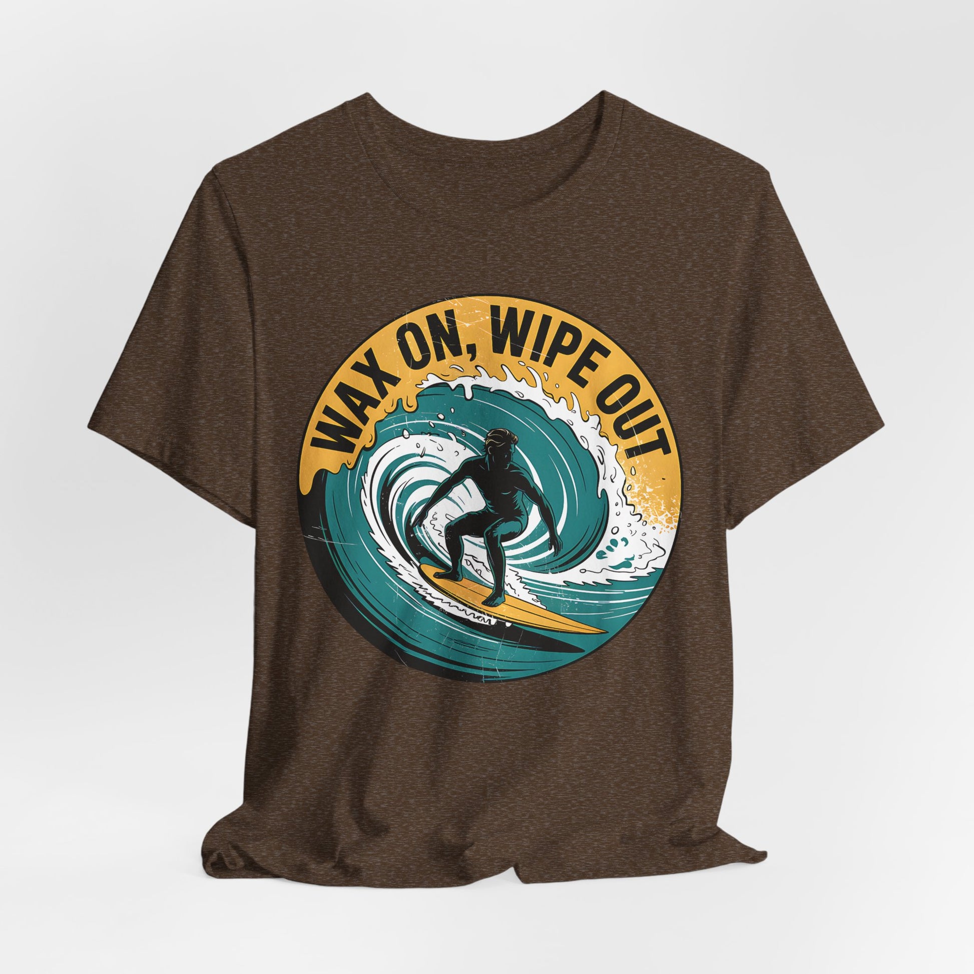 The Surfing Inspired Unisex Short Sleeve T-Shirt - Wax On, Wipe Out features a brown jersey tee with a graphic of a surfer riding a wave and yellow WAX ON, WIPE OUT text in a circular design—ideal for surf fans and beach lovers.