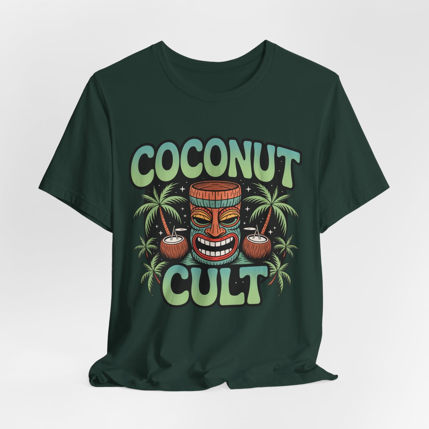 The Coconut Cult Unisex Jersey Tiki T-Shirt showcases vibrant artwork—COCONUT CULT text, tiki mask, coconuts, and palm trees. Made from soft Airlume cotton. Perfect for beach lovers and tropical vibes!.