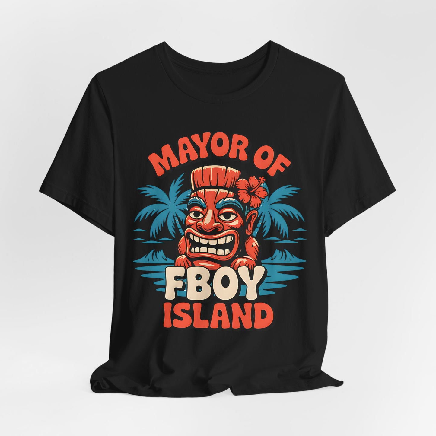 The Mayor of FBOY Island Short Sleeve Tiki T-Shirt is a black, 100% Airlume cotton tee featuring a colorful Tiki face with a flower, palm trees, and bold MAYOR OF FBOY ISLAND text—perfect for summer vibes and playful spirits.