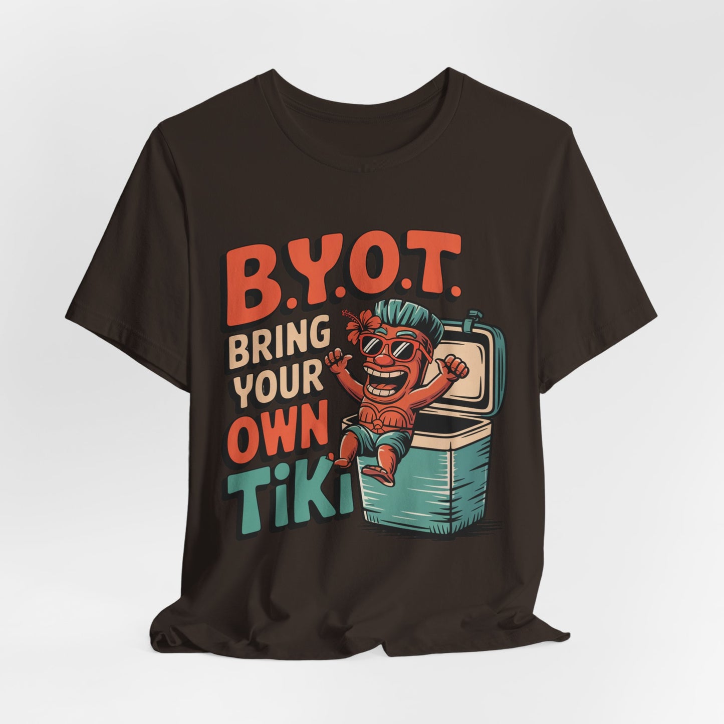 The Bring Your Own Tiki Short Sleeve Tiki T-Shirt is a black unisex tee with a smiling tiki in sunglasses lounging in a cooler, B.Y.O.T. lettering, and soft Airlume cotton—perfect for vibrant summer parties.
