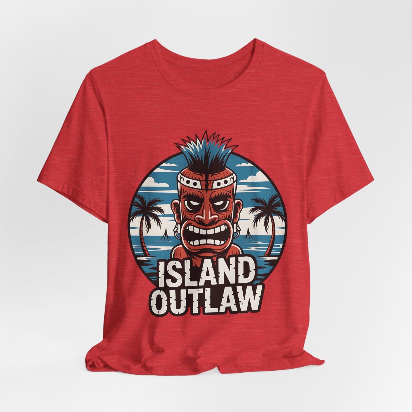The Island Outlaw Tiki T-Shirt is a red unisex jersey tee with a fierce tiki mask, spiky blue hair, palm trees, waves, and birds—perfect for tropical vibes. ISLAND OUTLAW stands out in bold white below the design.