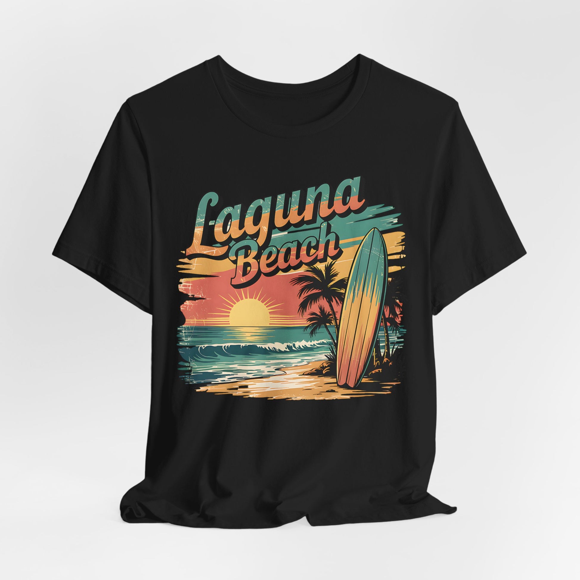 The Laguna Beach Surf Tee - Unisex Jersey Short Sleeve Shirt for Beach Lovers features a colorful retro design with Laguna Beach, a sunset, palm trees, and a surfboard—perfect for stylish comfort at the beach.