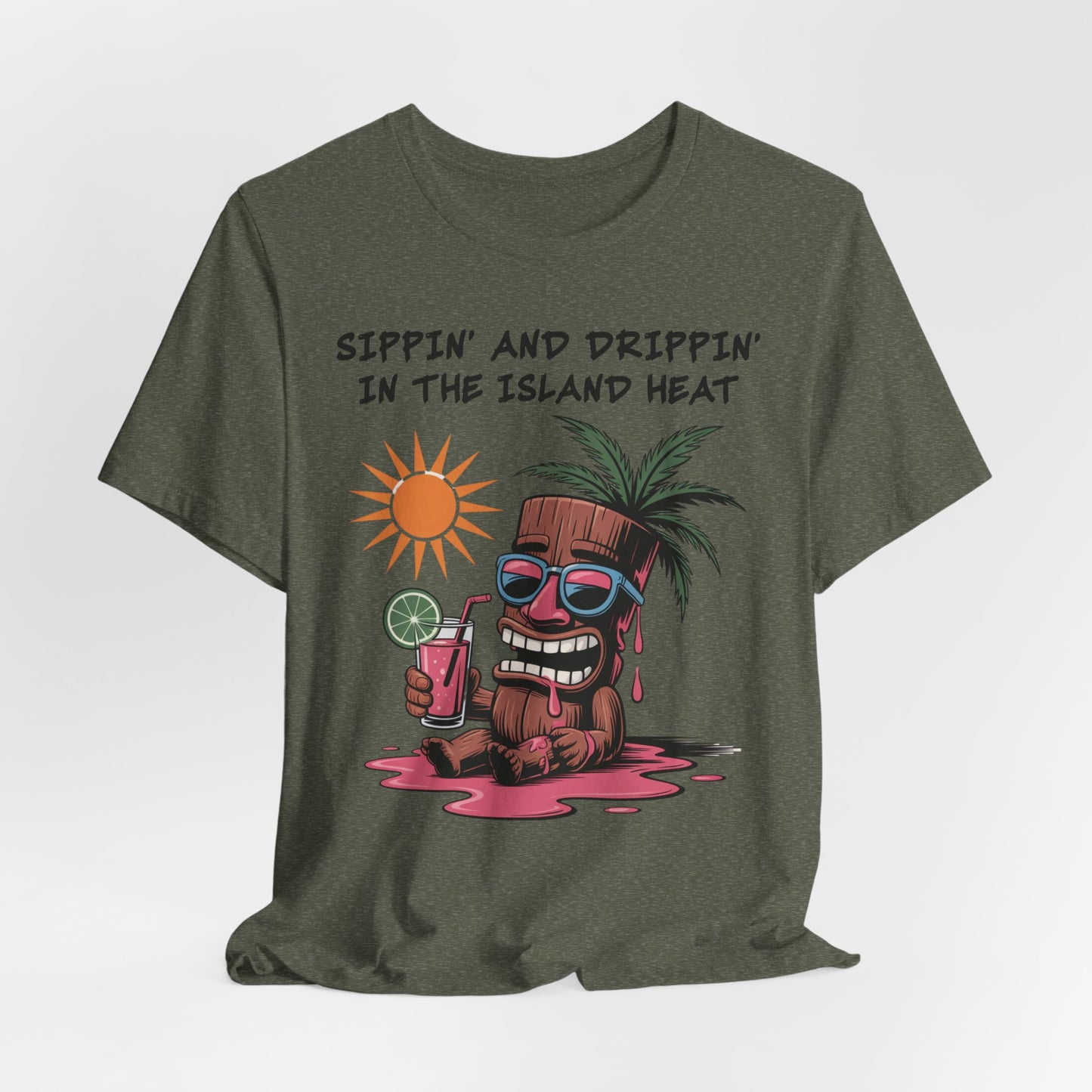 The green Tropical Vibes Tiki T-Shirt - Sippin and Drippin in the Island Heat features a cartoon coconut with sunglasses, sweating, holding a tropical drink under a bright sun for perfect island vibes.