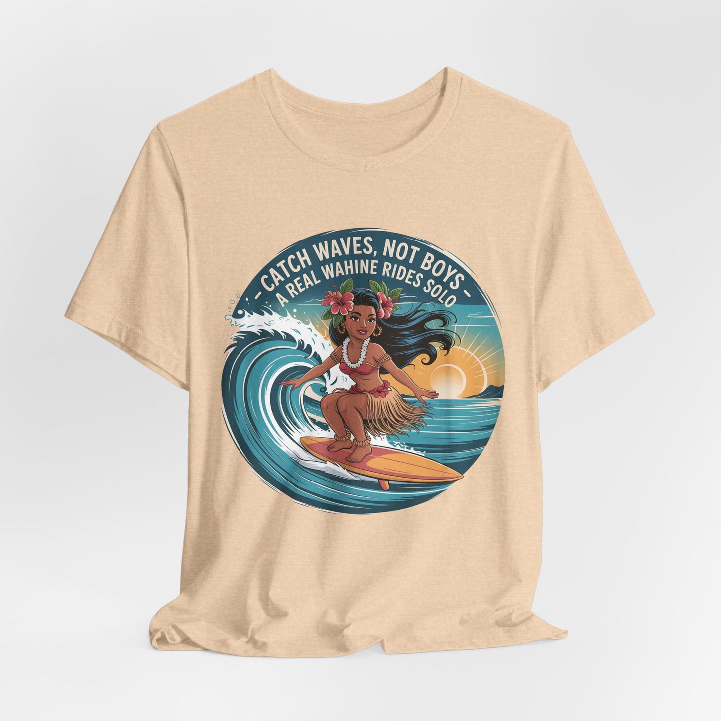 Catch Waves Not Boys Wahine T-Shirt – a surfing graphic shirt for beach lovers, featuring a woman surfing at sunset in a grass skirt and flower crown, with the text: “CATCH WAVES, NOT BOYS. A REAL WAHINE RIDES SOLO.”.