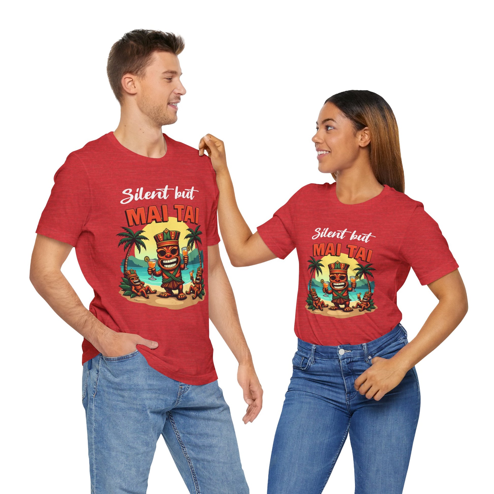 A smiling man and woman stand side by side in Mai Tai Graphic Unisex Jersey Tiki T-Shirts, featuring a colorful palm tree and “Silent but Mai Tai”—the perfect tropical vibes tee. Both have one hand in their jeans pocket.