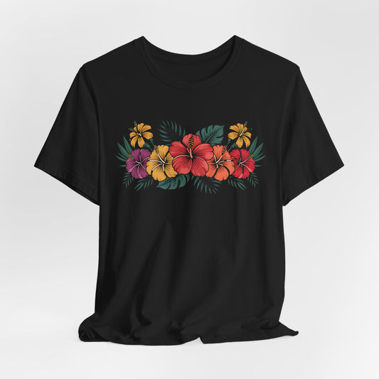 The Tropical Floral Unisex T-Shirt - Perfect for Summer Days features a vibrant floral print with red, yellow, and purple hibiscus flowers plus green leaves on soft black Airlume combed cotton.