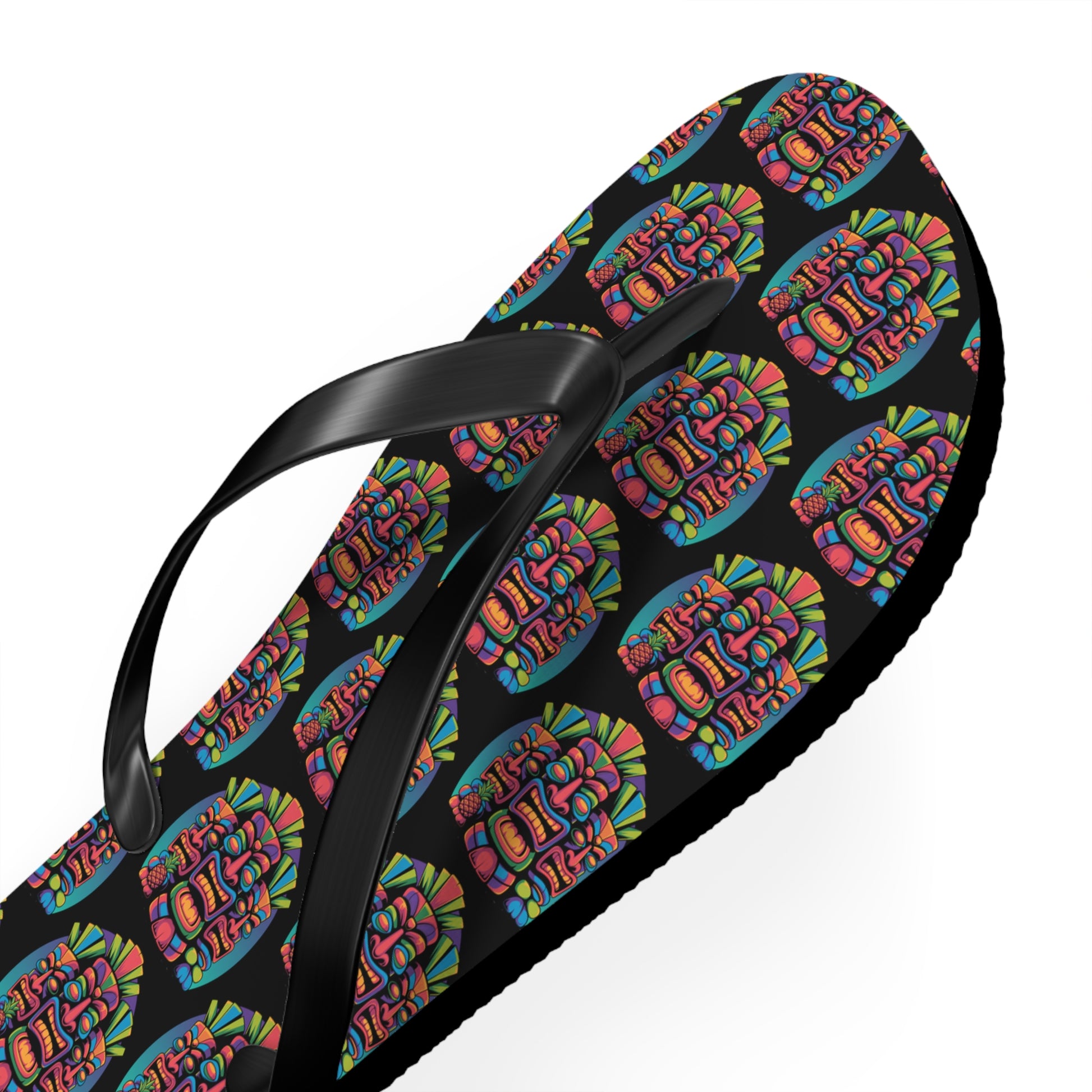 The Tropical Pineapple Flip Flops - Fun Summer Footwear feature black straps and a lively, repeating pineapple pattern on a dark background—ideal for bold summer outfits or standout beachwear.
