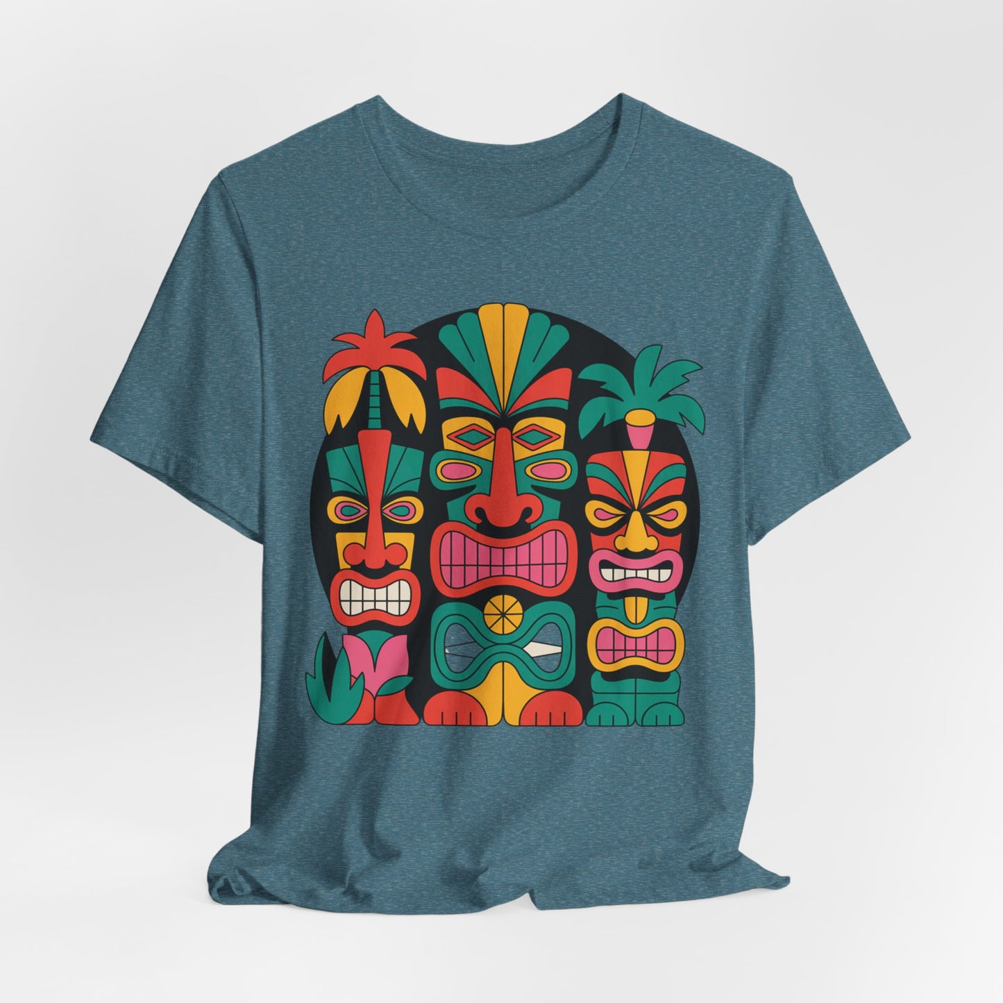 The Tiki Vibes Unisex Tiki T-Shirt is a colorful short sleeve tee for beach lovers, featuring four bold, stylized tiki masks with vibrant tropical patterns—perfect for anyone looking for a fun, eye-catching tropical vibe.