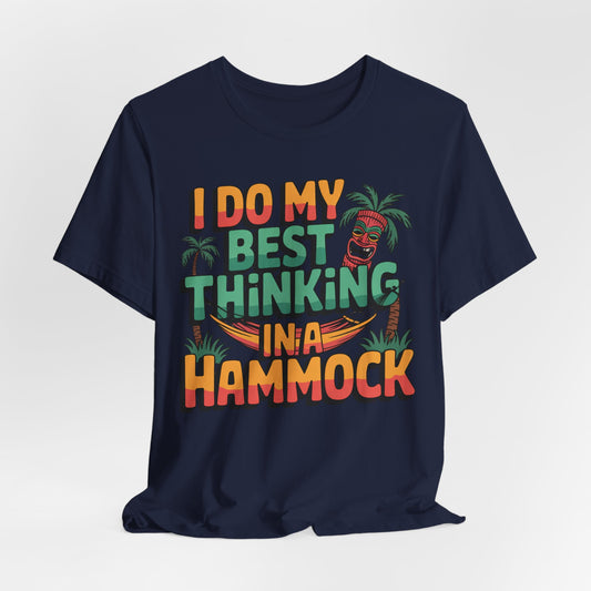 The I Do My Best Thinking in a Hammock Unisex Tiki T-Shirt features soft Airlume combed cotton, colorful text, palm trees, a tiki mask, and a hammock graphic for relaxed summer vibes.