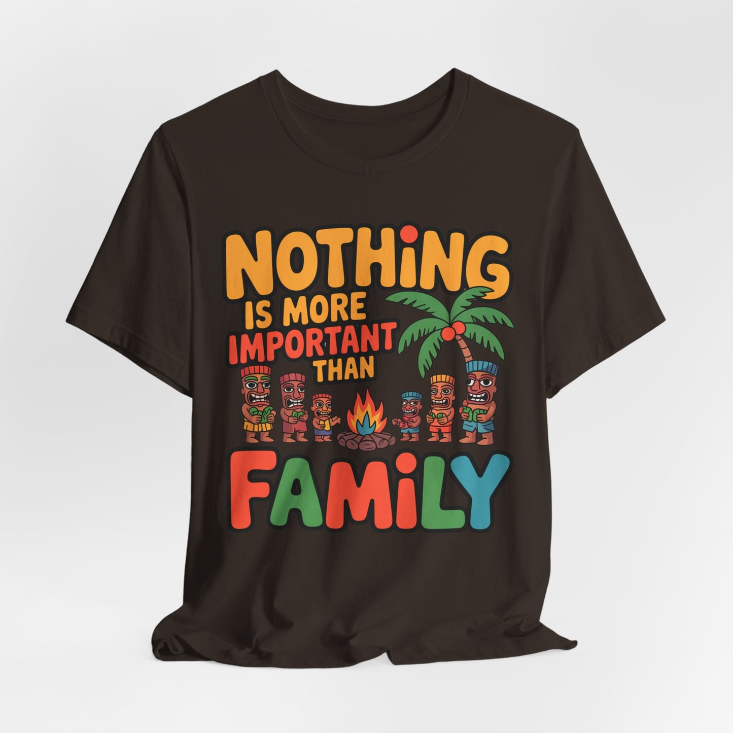 The Family Tiki Tee - Nothing is More Important Than Family Unisex T-Shirt features colorful text, tiki figures, a palm tree, and a campfire—making it a standout family statement piece.
