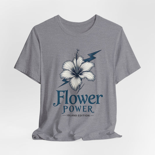 The Flower Power Graphic T-Shirt - Unisex Jersey Short Sleeve features a bold white hibiscus and blue lightning bolt design with Flower Power Island Edition text beneath, bringing vibrant island vibes to your look.