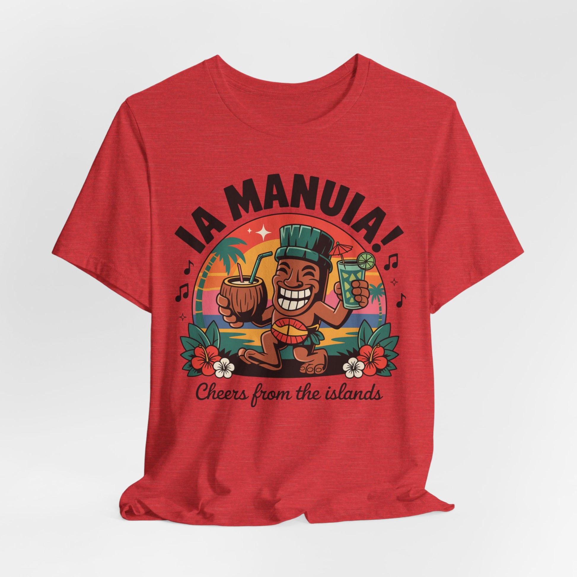 The IA MANUIA! Island Vibes Unisex Jersey Tiki T-Shirt is a red, breathable cotton tee featuring a cartoon tiki with a coconut drink, floral accents, and IA MANUIA! Cheers from the islands—perfect for tropical events.