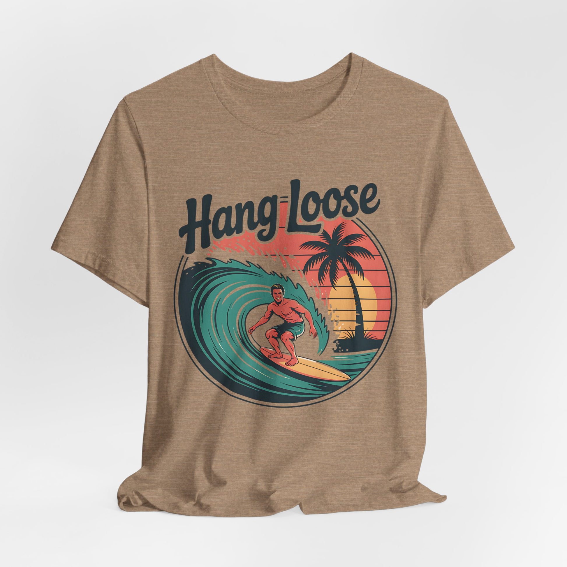 The Hang Loose Unisex Surf T-Shirt features a retro surfer, palm tree, and sunset. Made from soft Airlume cotton, this tee captures laid-back beach vibes with Hang Loose above the image.
