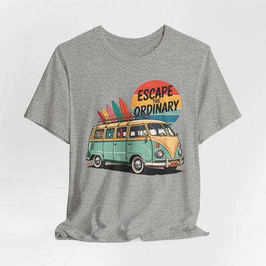 The Escape the Ordinary Surf Tee is a unisex jersey short sleeve shirt with a retro van, surfboards, and a colorful sunset. “Escape the Ordinary” headlines the design, making it perfect for summer festivals and adventure lovers.