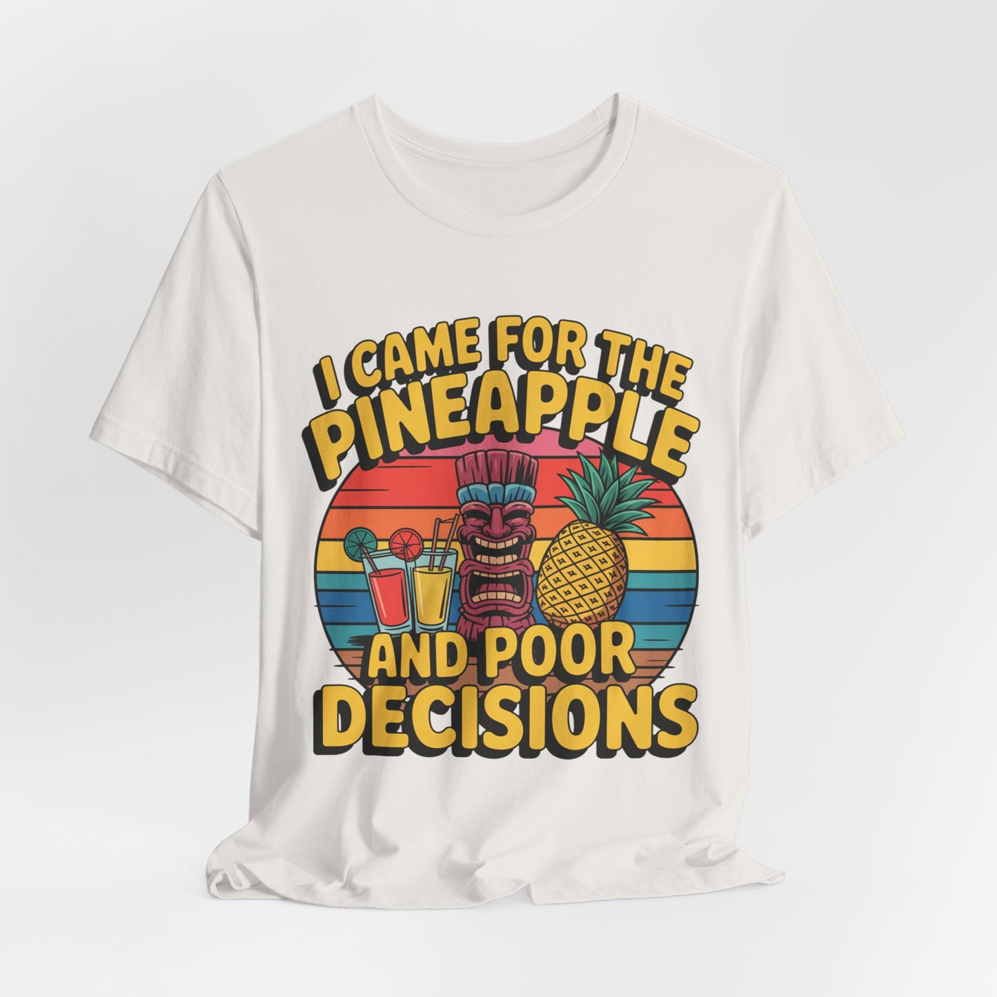 The Tropical Humor Tiki T-Shirt features a vibrant tiki mask, pineapple, tropical drinks, and sunset with bold text: I Came for the Pineapple and Poor Decisions. This fun unisex tee is perfect for casual gatherings and summer vibes.