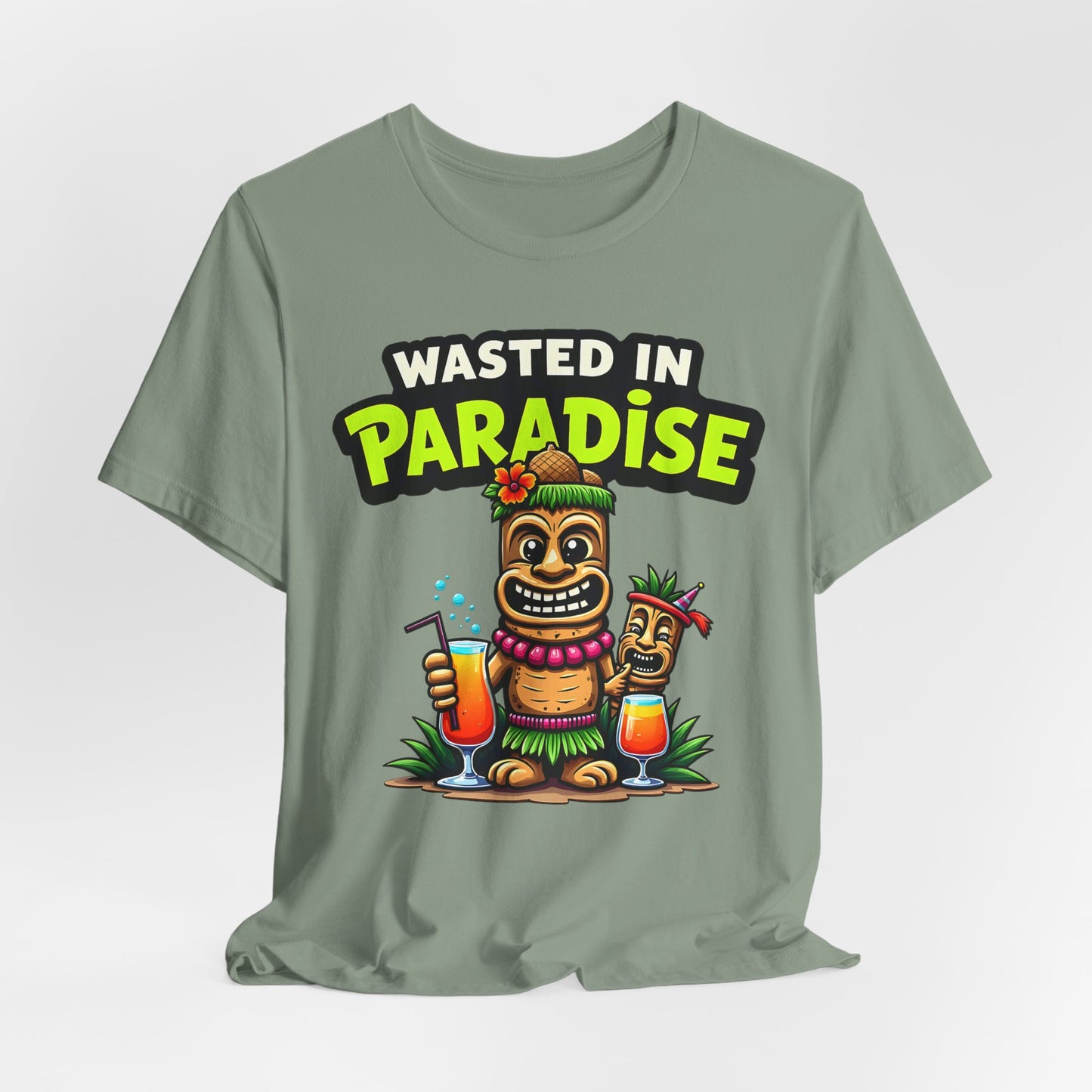 The Wasted in Paradise Graphic Tiki T-Shirt is a light green, unisex jersey tee featuring cartoon tikis with drinks and the phrase “WASTED IN PARADISE”—a fun pick for any beach lover’s vacation wardrobe.