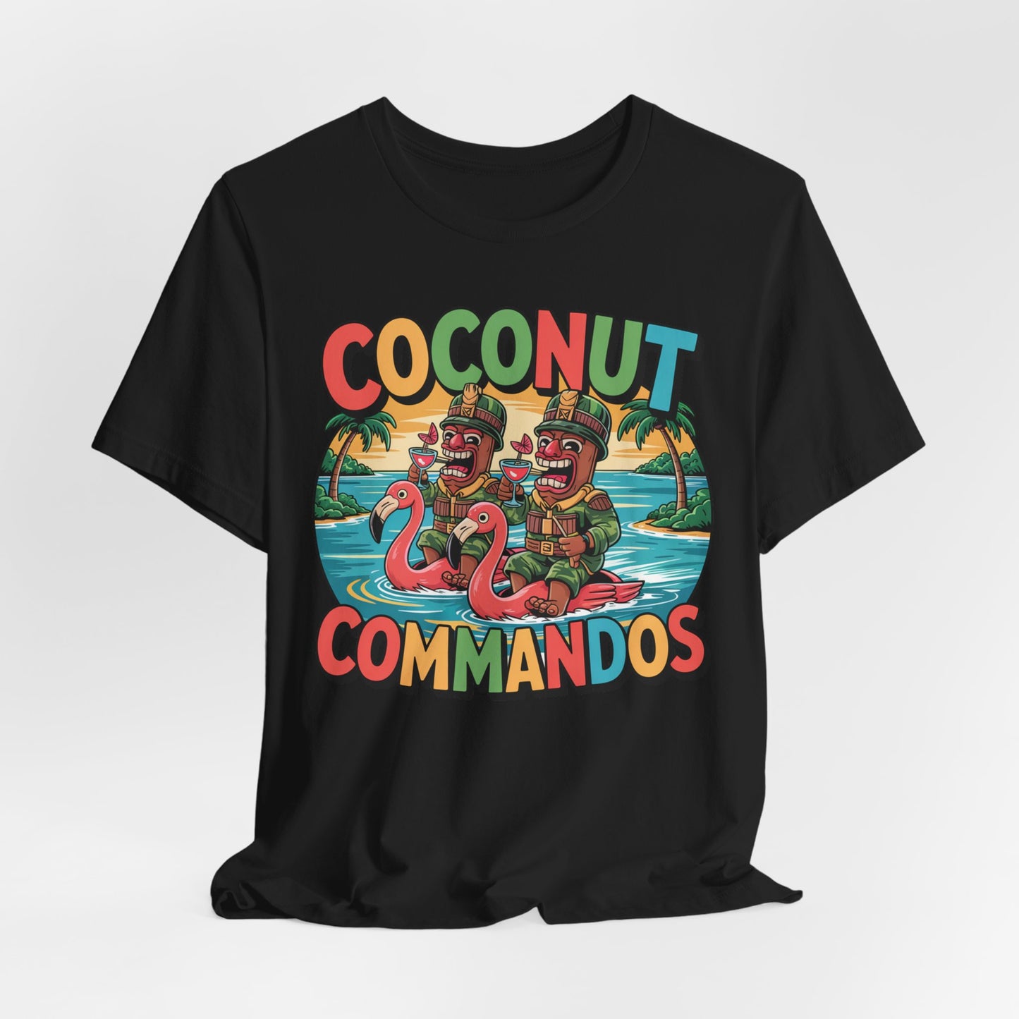 The Coconut Commandos Graphic Tiki T-Shirt features a colorful cartoon of two coconut-headed Coconut Commandos on flamingo floats, set against palm trees and a sunset for a fun tropical summer vibe. Perfect for beach lovers.