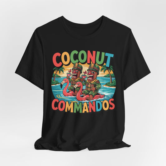 The Coconut Commandos Graphic Tiki T-Shirt features a colorful cartoon of two coconut-headed Coconut Commandos on flamingo floats, set against palm trees and a sunset for a fun tropical summer vibe. Perfect for beach lovers.