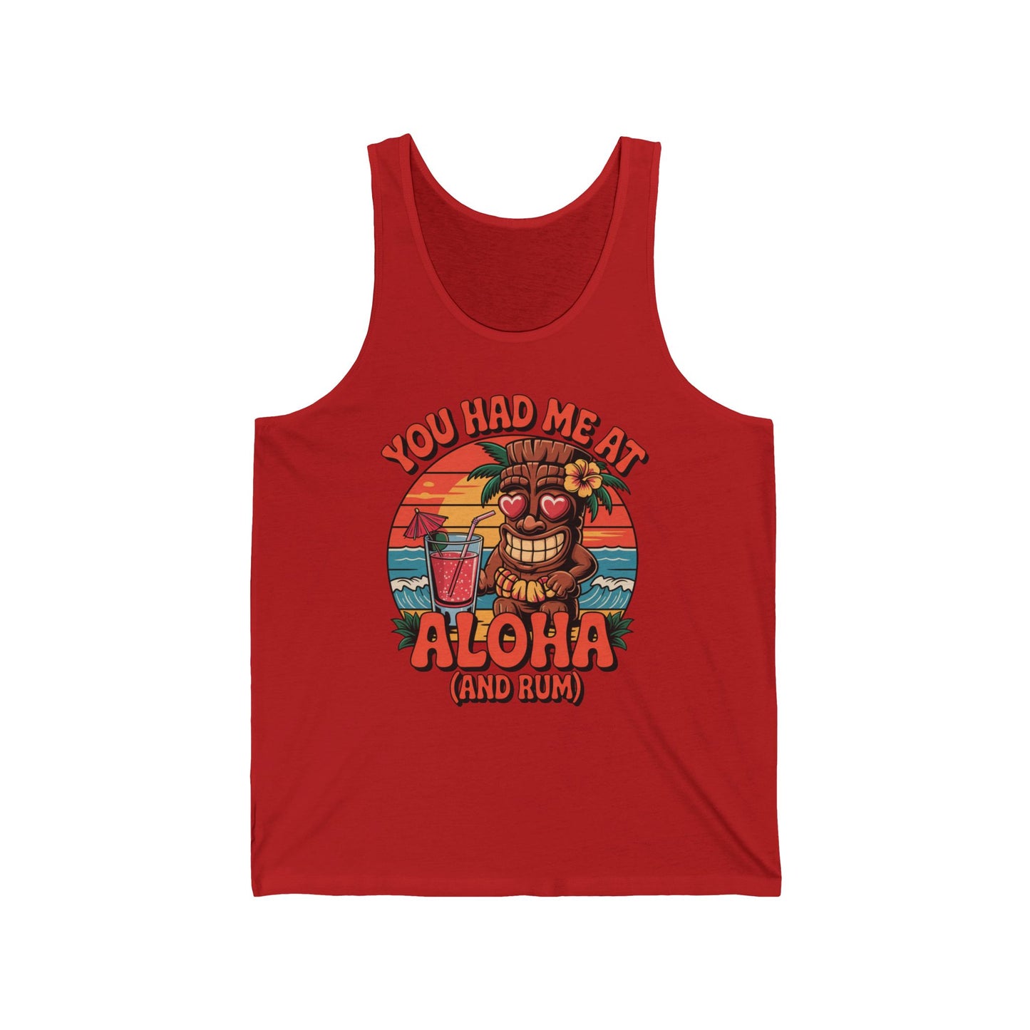 Add a tropical vibe to your style with the Aloha Tiki Tank Top: a unisex jersey tank featuring a tiki statue in heart sunglasses, palm trees, sunset, cocktail, and “You had me at Aloha (and rum)”—perfect for true beach lovers.