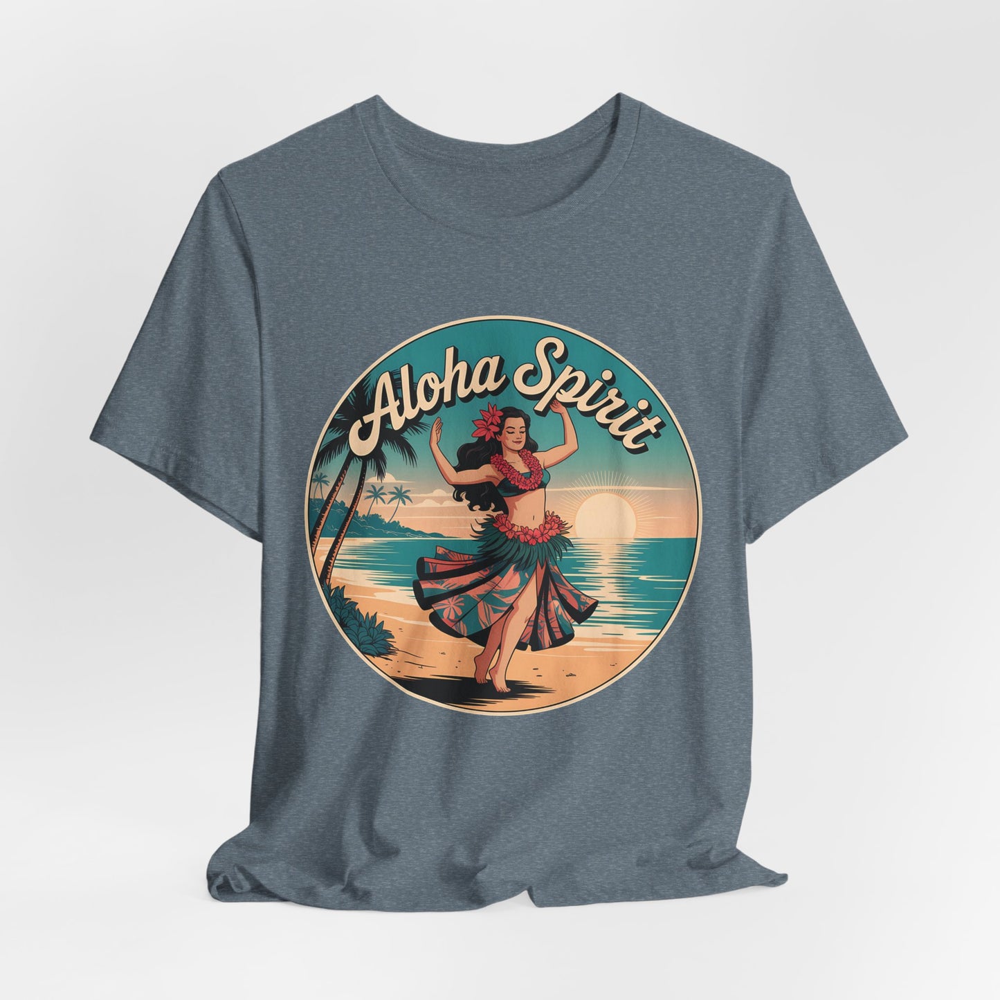 The Aloha Spirit Graphic T-Shirt features a vintage hula dancer on a sunset beach with palm trees and waves—perfect for beach lovers and island dreamers.