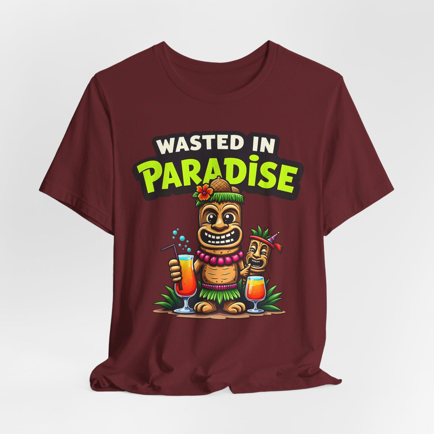 The Wasted in Paradise Graphic Tiki T-Shirt features cartoon tiki statues, cocktails, and a vibrant design—ideal for beach parties or vacation style. Unisex Jersey Short Sleeve T-Shirt perfect for beach lovers.