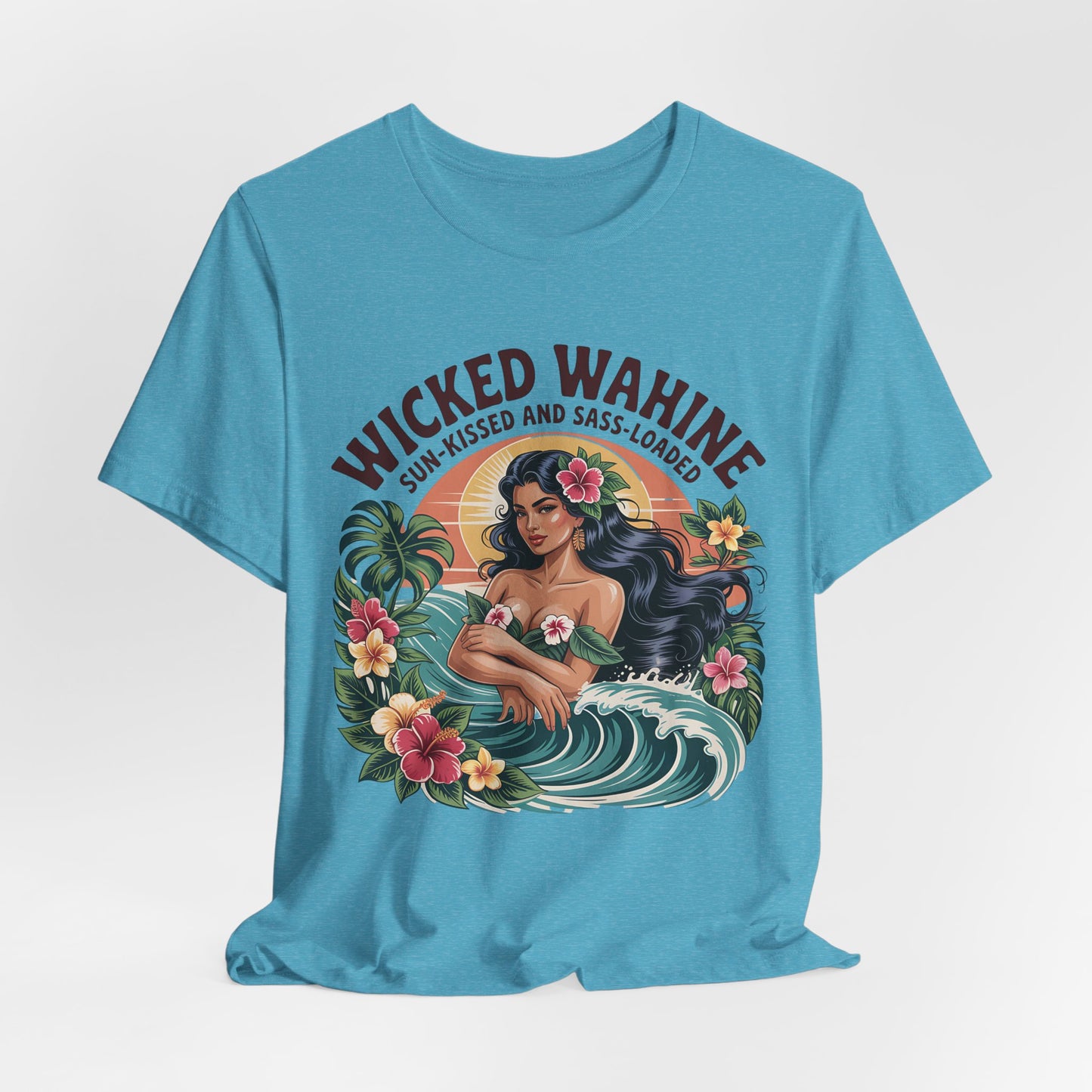 The Wicked Wahine Graphic T-Shirt - Sun-Kissed and Sass-Laden Unisex Jersey Shirt features a blue tee with an illustrated woman amid tropical flowers and waves, plus bold WICKED WAHINE text and SUN-KISSED AND SASS-LOADED underneath.