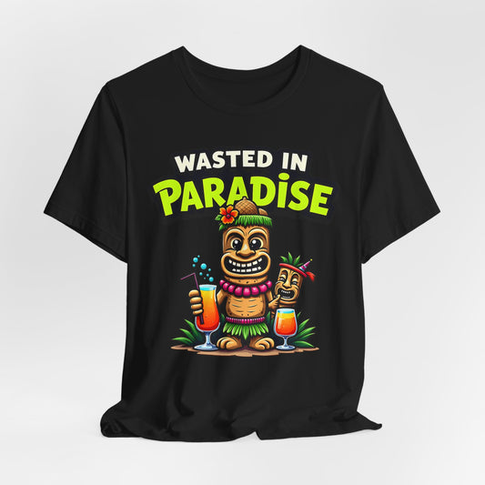 The Wasted in Paradise Graphic Tiki T-Shirt—Unisex Jersey Short Sleeve—features a smiling tiki in a grass skirt with drinks and mask, Wasted in Paradise text, and is perfect for beach lovers and vacation wardrobes.