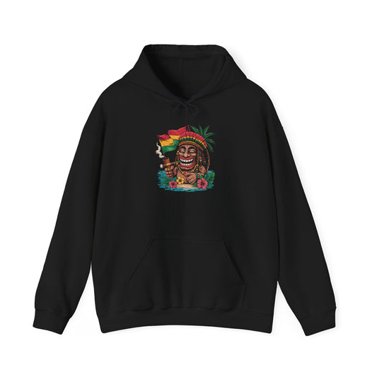The Tropical Vibe Tiki Hoodie - Unisex Heavy Blend™ Hooded Sweatshirt with Island Design features a colorful smiling tiki head, dreadlocks, sunglasses, palm leaves, Jamaican flag, smoke, and tropical flowers—great for island vibes.