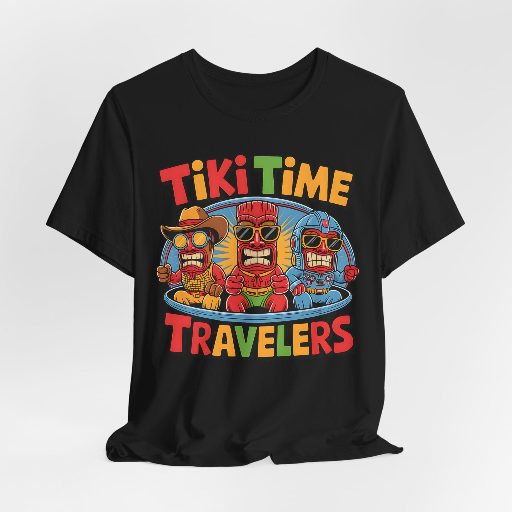 The Tiki Time Travelers Unisex Tiki T-Shirt features three vibrant cartoon tikis in a blue car with bold, multicolored Tiki Time Travelers text. Fun & perfect for summer beach parties!.
