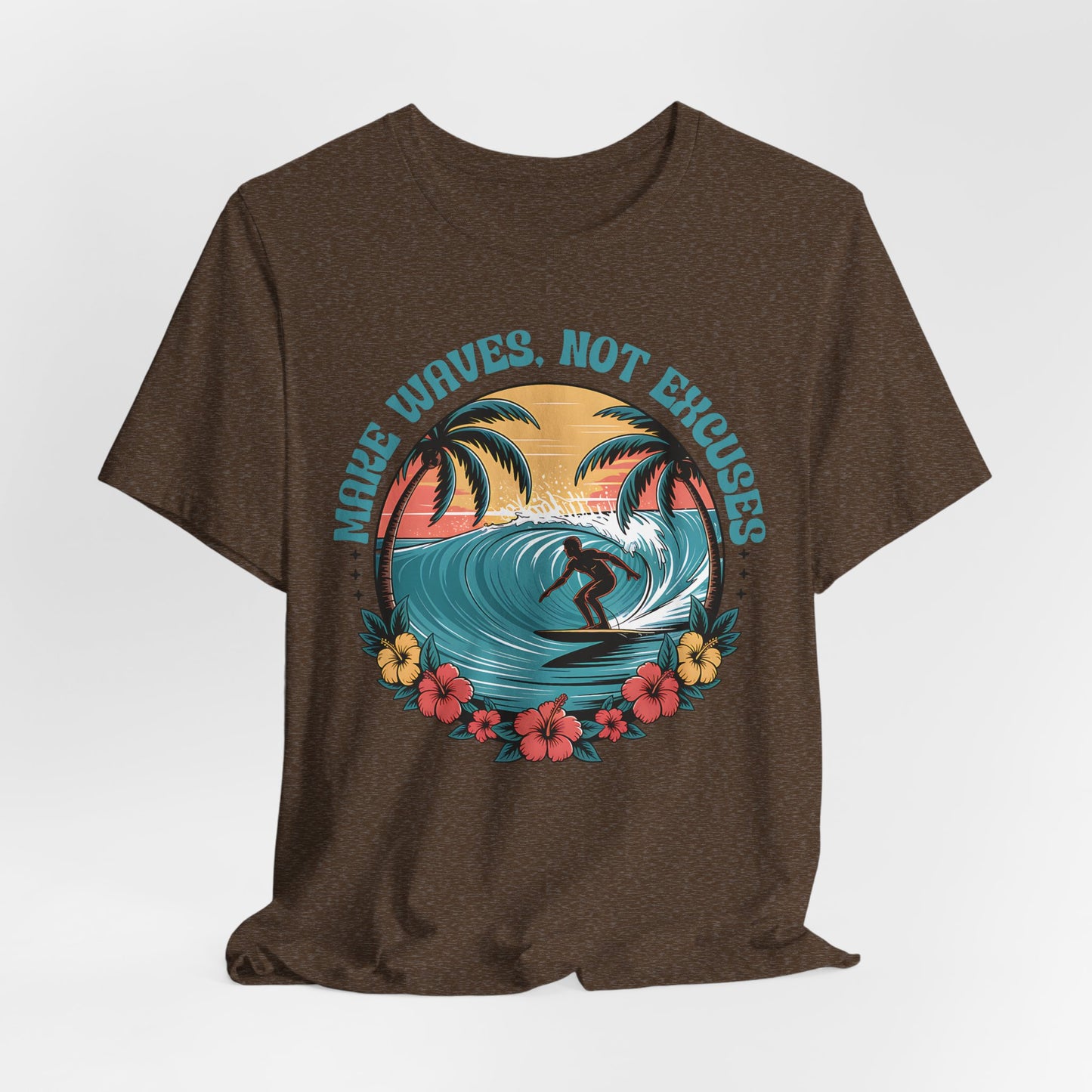 The Surf Tee - Make Waves Not Excuses - Inspirational T-Shirt is brown and showcases a vibrant surfer graphic with palm trees, flowers, and a sunset. MAKE WAVES. NOT EXCUSES. circles the design, making it perfect for beach trips.