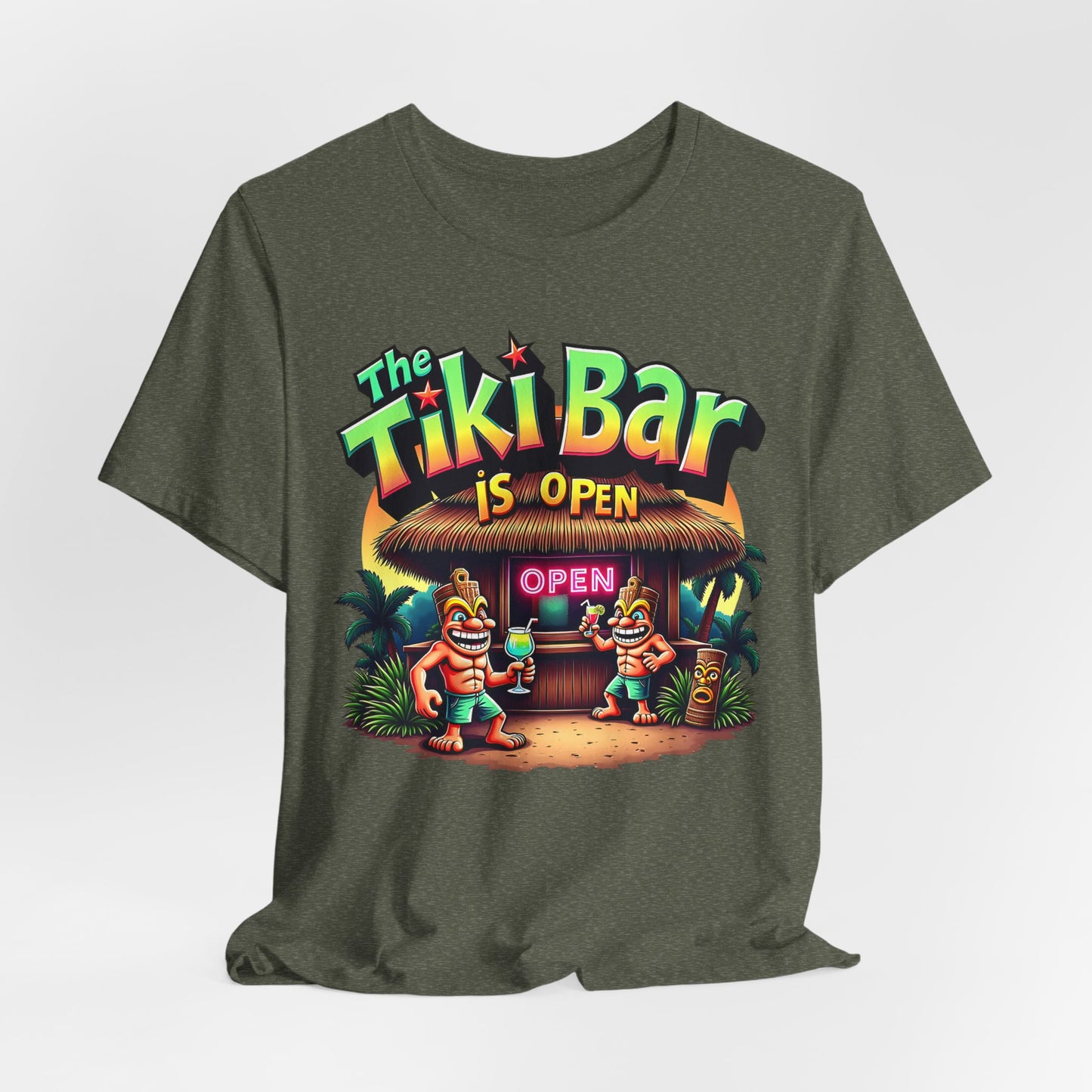 The Tiki Bar Is Open Tiki T-Shirt - Summer Vibes Beachwear features soft green Airlume cotton and two tiki cartoon characters with drinks at a tiki bar. A neon sign reads, The Tiki Bar is Open—perfect for summer holidays!.